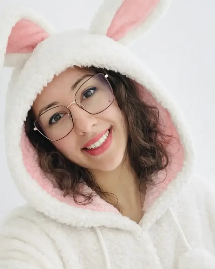 Lora in a bunny hoodie, not taking herself too seriously